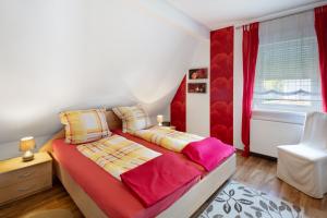 Postel nebo postele na pokoji v ubytování Ferienwohnung Vierheller