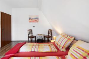 Postel nebo postele na pokoji v ubytování Ferienwohnung Vierheller