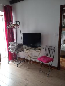 Μια τηλεόραση ή/και κέντρο ψυχαγωγίας στο logement entier 5 personnes