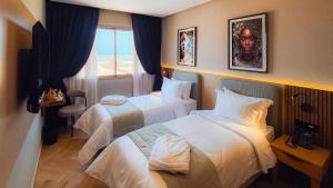 Letto o letti in una camera di Elite View Hotel Dakhla