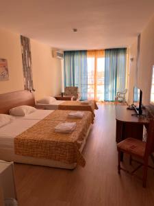 Postel nebo postele na pokoji v ubytování Hotel Star + 15 fotografií