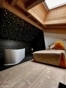 Postel nebo postele na pokoji v ubytování Bazzario Loft