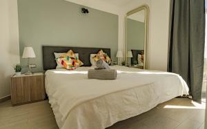 Ένα ή περισσότερα κρεβάτια σε δωμάτιο στο Penthouse-Wohnung Tomillo
