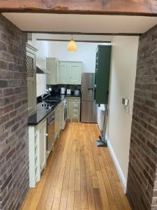 Kuchyň nebo kuchyňský kout v ubytování Marguerita villas Apartment