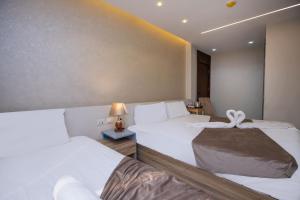 Voodi või voodid majutusasutuse Khattab Pyramids View Hotel toas