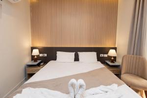 Voodi või voodid majutusasutuse Khattab Pyramids View Hotel toas