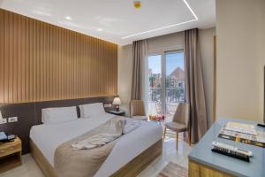 Voodi või voodid majutusasutuse Khattab Pyramids View Hotel toas