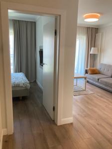 En eller flere senge i et værelse på Mennica Residence de luxe Waliców 11