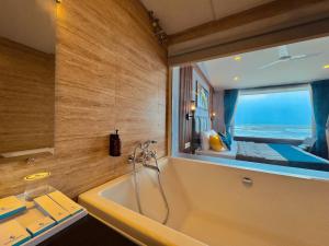 Vannituba majutusasutuses Sandbanks Beach Villas, Morjim