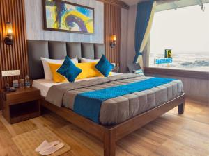 Voodi või voodid majutusasutuse Sandbanks Beach Villas, Morjim toas