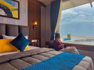 Voodi või voodid majutusasutuse Sandbanks Beach Villas, Morjim toas