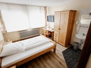 Voodi või voodid majutusasutuse Hotel-Restaurant Zum Schwalbennest toas