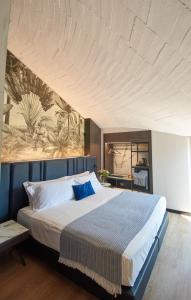 Postel nebo postele na pokoji v ubytování Hotel Leonessa