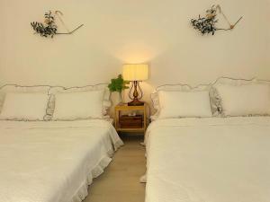 Postel nebo postele na pokoji v ubytování Seoul stay