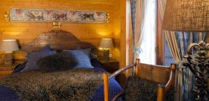 Postel nebo postele na pokoji v ubytování Chalet-Hôtel & Spa Les Cimes