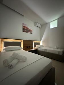 Voodi või voodid majutusasutuse Gael Luxury Apartment toas
