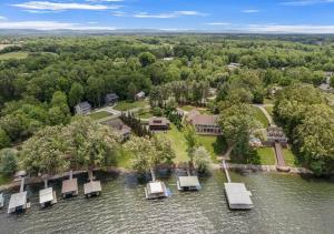 an aerial view of a house on a island in the water at Reflection Bay in Winchester