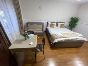 Postel nebo postele na pokoji v ubytování Therme Airport Resort