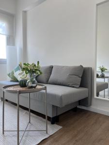 a living room with a couch and a table at Casa dei Sogni in Scalea +31 photos