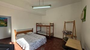 Een bed of bedden in een kamer bij Tagua Hospedaje