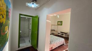Een bed of bedden in een kamer bij Tagua Hospedaje