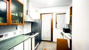 Kuchyň nebo kuchyňský kout v ubytování Venice B&B