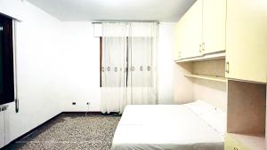 Postel nebo postele na pokoji v ubytování Venice B&B