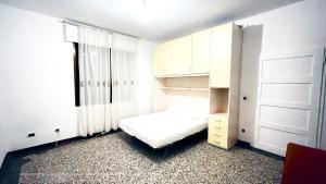Postel nebo postele na pokoji v ubytování Venice B&B