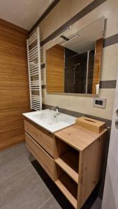 a bathroom with a sink and a mirror at My home in Sarzana in Sarzana +43 photos