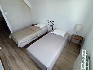 Ένα ή περισσότερα κρεβάτια σε δωμάτιο στο La perle de Châteauneuf