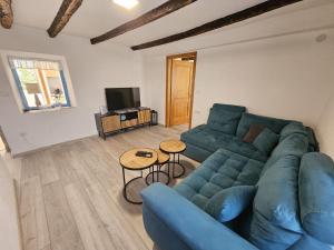 TV a/nebo společenská místnost v ubytování Villa Nautia Stone House