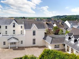 an aerial view of a large white house at Harbour Beach at The Hideaway in Tenby