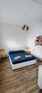 Postel nebo postele na pokoji v ubytování Lago Maggiore Lake Me Home apartment