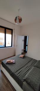 Postel nebo postele na pokoji v ubytování Lago Maggiore Lake Me Home apartment