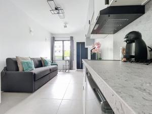 Χώρος καθιστικού στο Studio neuf cosy entre Paris et Disneyland