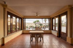 a dining room with a table and chairs at Ocean Home Sweet Home - Suite 1 in Rosarito