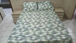 Ένα ή περισσότερα κρεβάτια σε δωμάτιο στο Localização Espetacular - Zona Norte - Sem Taxas +57 φωτογραφίες