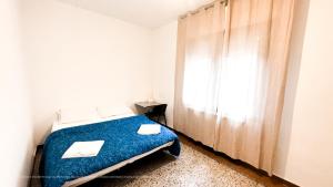 Postel nebo postele na pokoji v ubytování Venice B&B