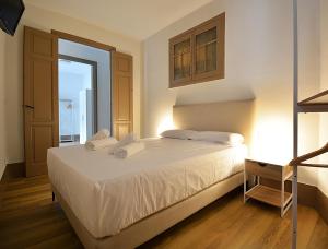Katil atau katil-katil dalam bilik di Apartamento Luz Divina +14 gambar