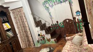 a room with a staircase and a room with a bed at Casa Guardiola 2 in Pacentro