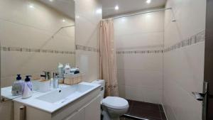Koupelna v ubytování Kandahar Private Apartments + 18 fotografií