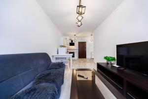 Kuchyň nebo kuchyňský kout v ubytování Cozy New Town Apartment- City Centre Rzeszow by StayNest + 8 fotografií