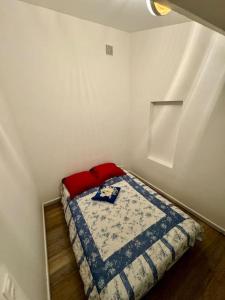 Katil atau katil-katil dalam bilik di Logement avec 1 chambre