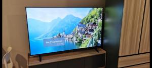 a flat screen tv sitting on top of a cabinet at Super View in Pattaya South