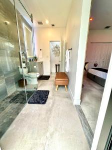 a bathroom with a shower and a sink at Tropical Studio in Miami +26 photos