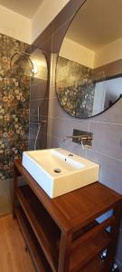 Kúpeľňa v ubytovaní Hotel Arimannia