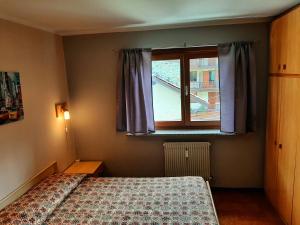 Postel nebo postele na pokoji v ubytování CIVICO 43 Interno 11