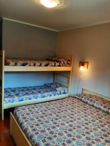 Postel nebo postele na pokoji v ubytování CIVICO 43 Interno 11