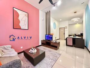 a large living room with a pink wall at Amari Lagoon Melaka Kids Friendly I 5min Zoo Melaka in Melaka