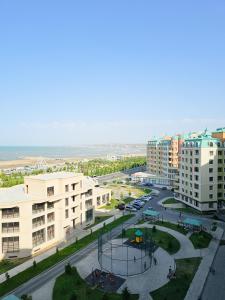 an aerial view of a city with buildings and a street at Guesthouse - 3 room in Sumqayıt